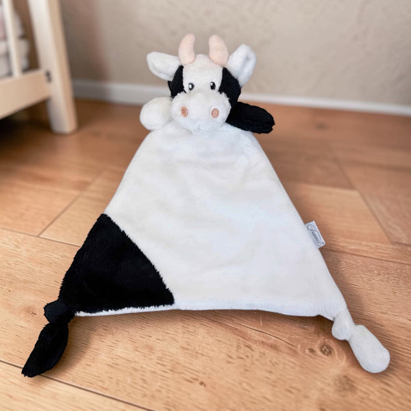 Gepersonaliseerd knuffeldoekje koe Muka van SaZuDesigns in zwart-wit pluche met zachte tutdoek voor baby's en newborns.
