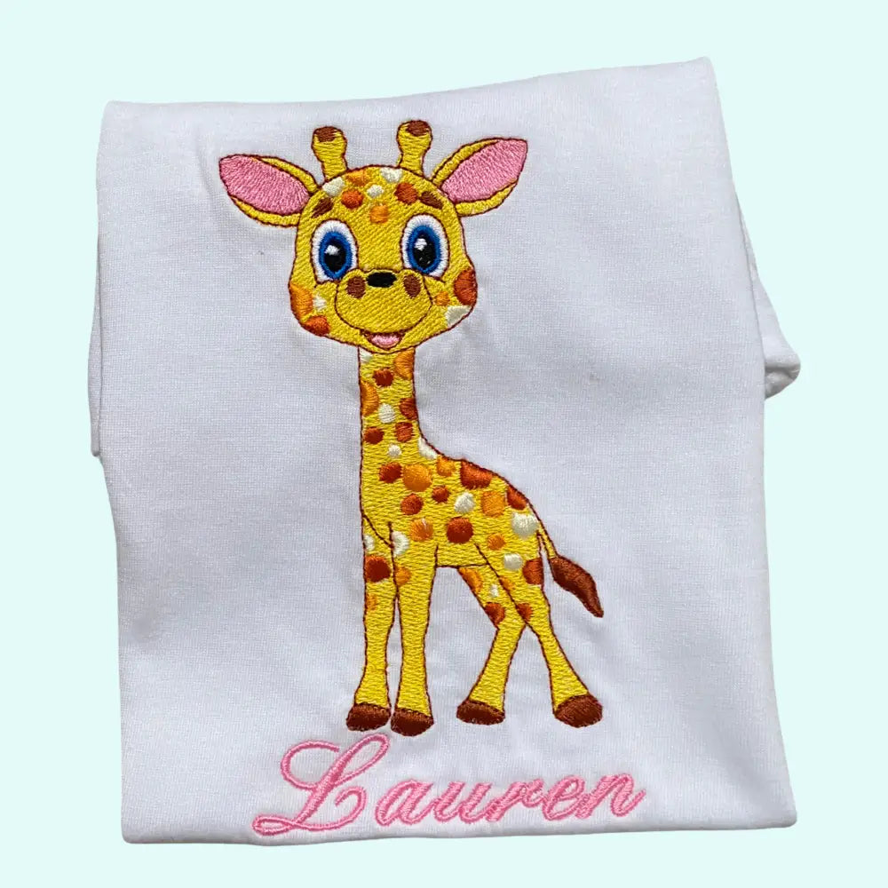 "Kindershirt met geborduurde giraffe, perfect bijpassend met babyromper."